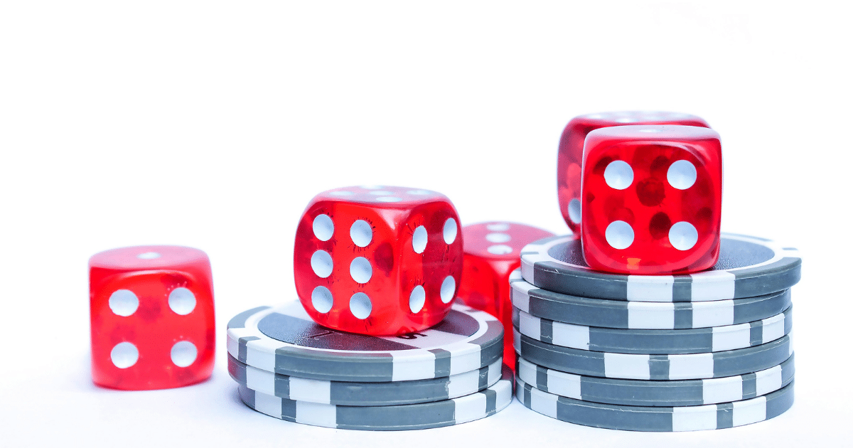 AD_4nXfLkmd9vXvPdyL5AtEPfrMGYU_42oo1jHzcISfyOTGyb2C-uzYdg0To4jBF5iMPwJXZ5cmp1PULFe7VVzAu0cG0qIWnCZklWU66_EkxPz_-d7fYAeEa2BYimEoP9NgJVX_wBCIR - Tennessee Behavioral Health Gambling addiction treatment: Red dice and poker chips, symbolizing risk and the need for effective recovery options.