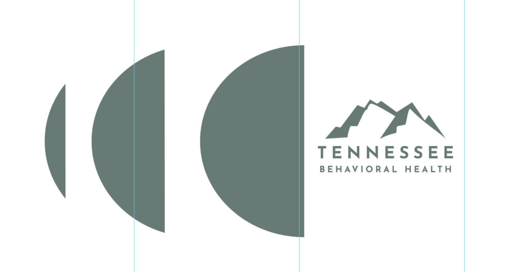 Tennessee Behavioral Health logo with mountain peaks and teal arcs and the company name text nearby.